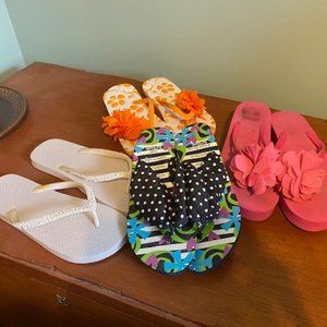 Four pairs of flip flops